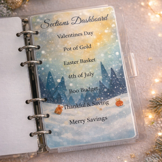 Holiday-themed budgeting planner with festive decorations on a pink surface