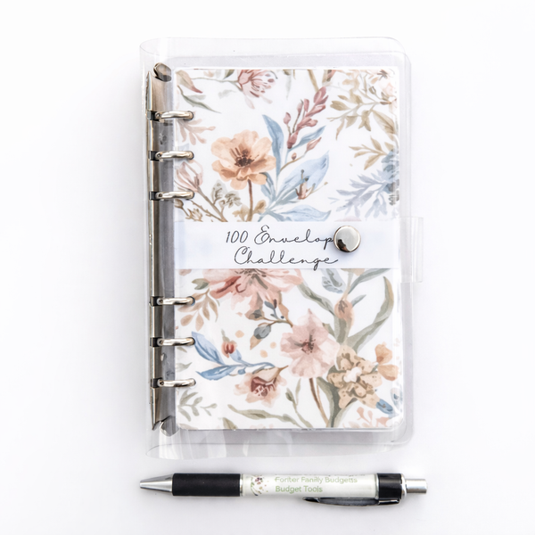 Floral planner with a pen on a white background