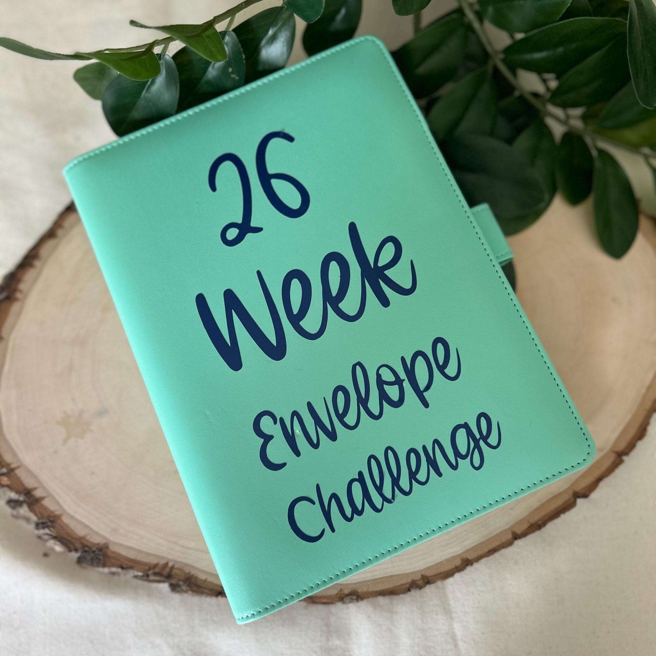 Minimalist 26 Week Savings Challenge printable with numbered envelopes and savings goals, designed for budgeting and money-saving enthusiasts to track progress and achieve financial goals efficiently.