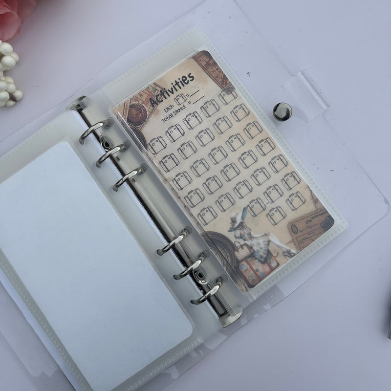 Open planner with a decorative page featuring a cow illustration on a light background