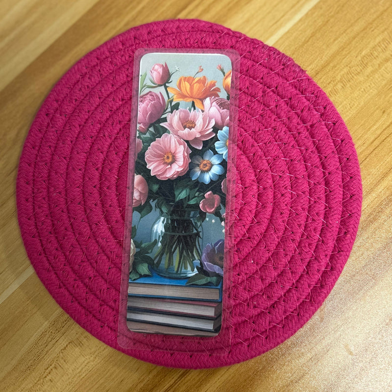 A set of floral botanical bookmarks featuring delicate flower illustrations and book-themed designs, displayed on a neutral background. Perfect for readers, journalers, and stationery lovers.