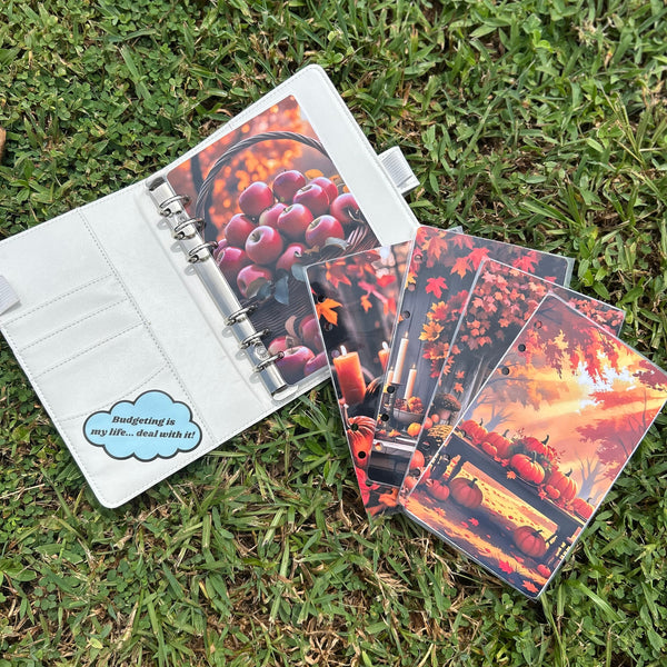 Planner with colorful design on grass