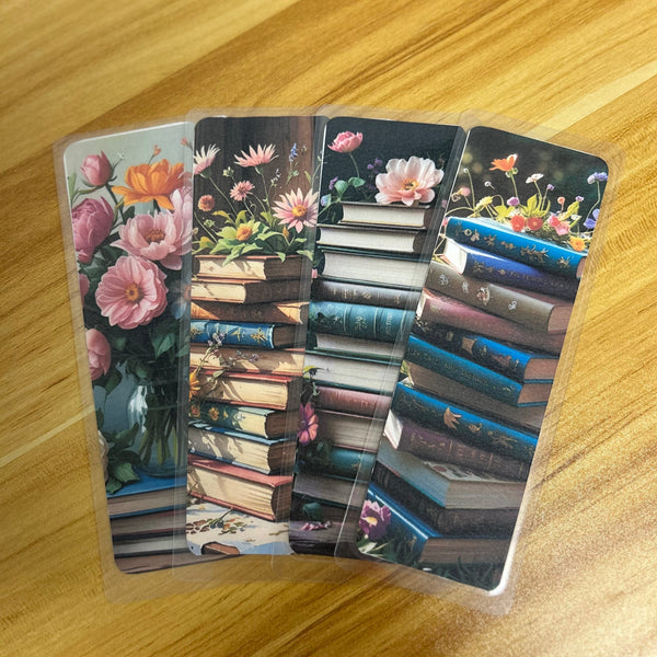A set of floral botanical bookmarks featuring delicate flower illustrations and book-themed designs, displayed on a neutral background. Perfect for readers, journalers, and stationery lovers.