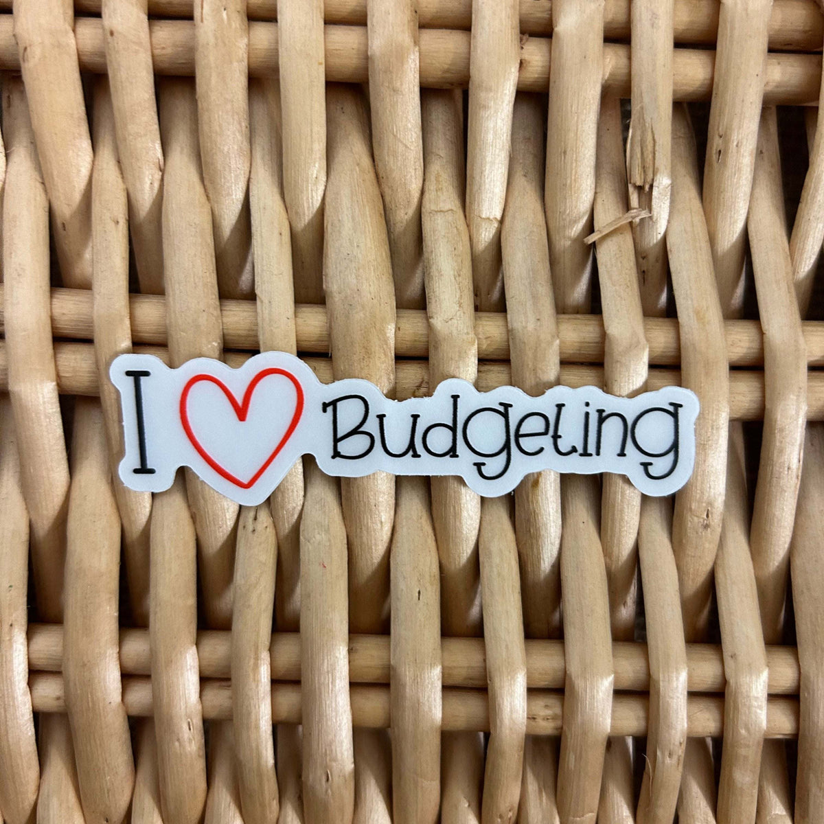 This Custom sticker that is colorful 'I Love Budgeting' sticker featuring bold, playful lettering with a heart icon, perfect for planners, laptops, or journals to show off a love for financial planning and money management.