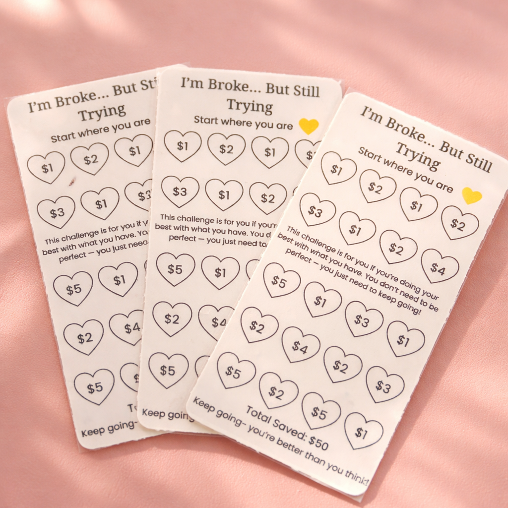 Three 'I'm Broke... But Still Trying' challenge cards on a pink background
