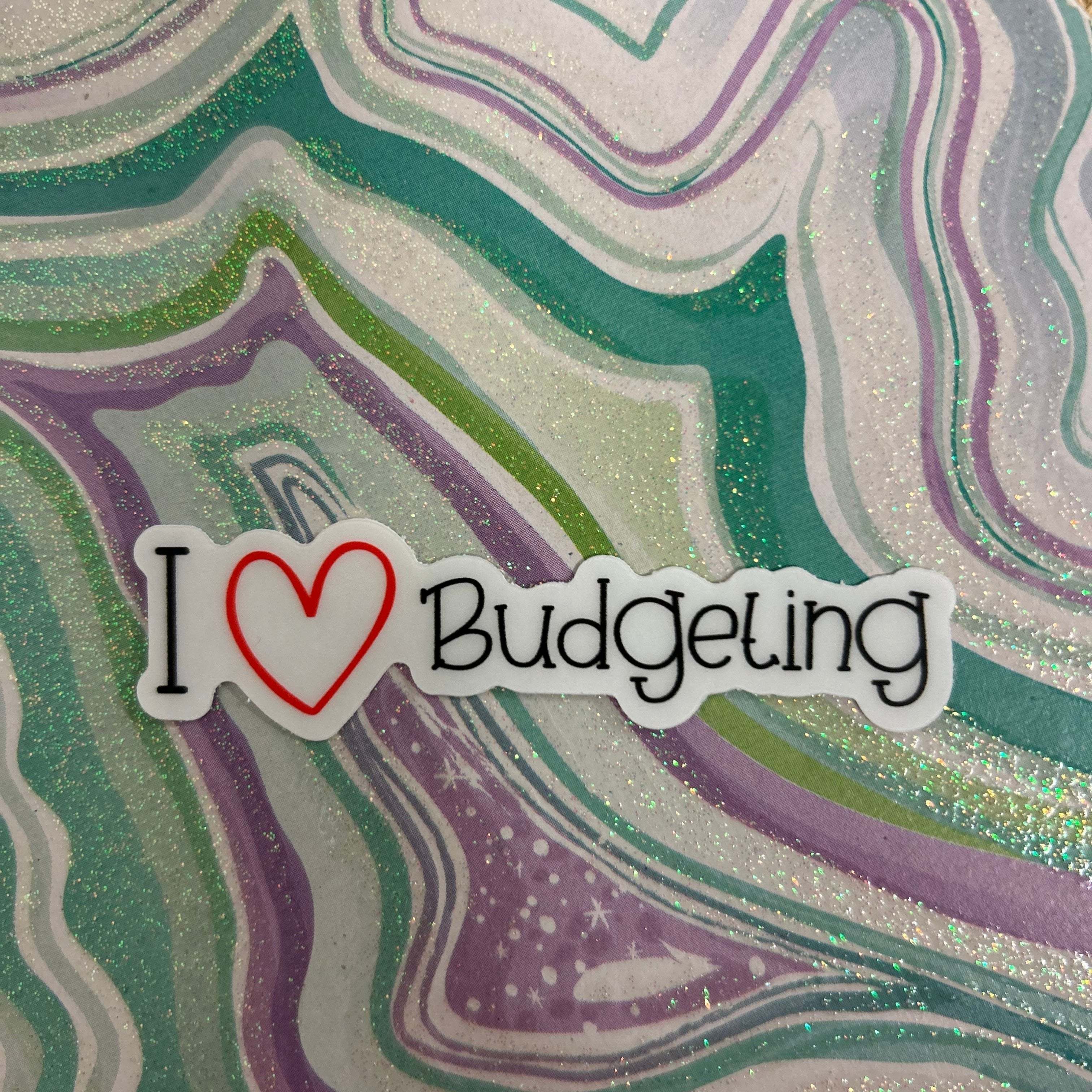 This Custom sticker that is colorful 'I Love Budgeting' sticker featuring bold, playful lettering with a heart icon, perfect for planners, laptops, or journals to show off a love for financial planning and money management.