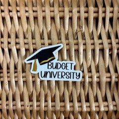 Budget University Sticker featuring a sleek design with bold text and playful money-themed elements, perfect for students and budget enthusiasts to personalize laptops, notebooks, or planners- Custom Sticker