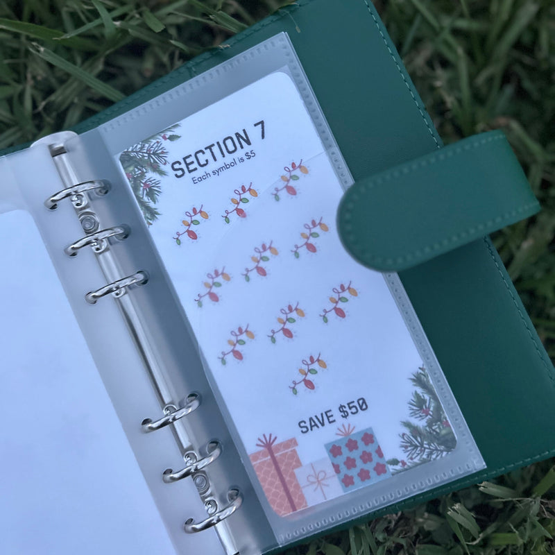 Green planner with a section labeled 'Section 7' and a discount card on grass