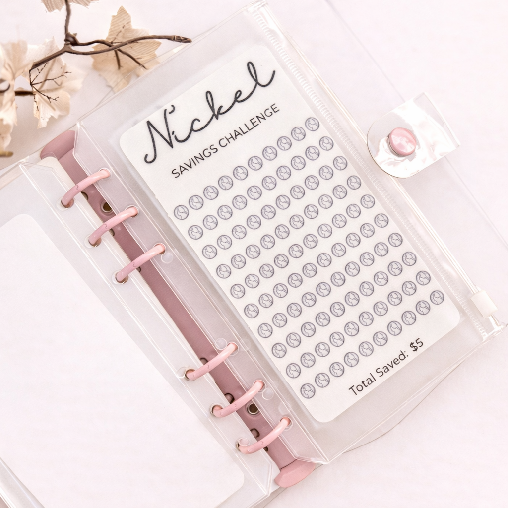 Savings challenge tracker with pink ribbons and floral decorations on a white background