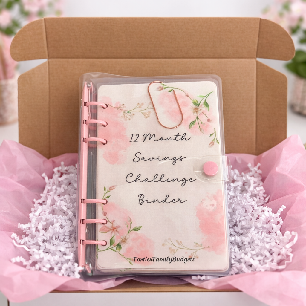 12 Month Savings Challenge Binder with floral design in a box with pink tissue paper