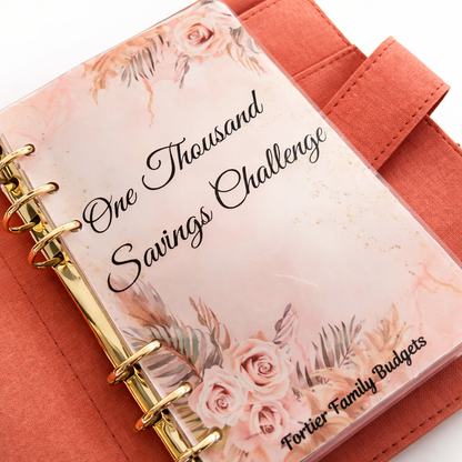 Planner with floral design and text on a pink background