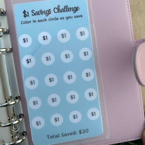 Pink savings challenge tracker with a card inside