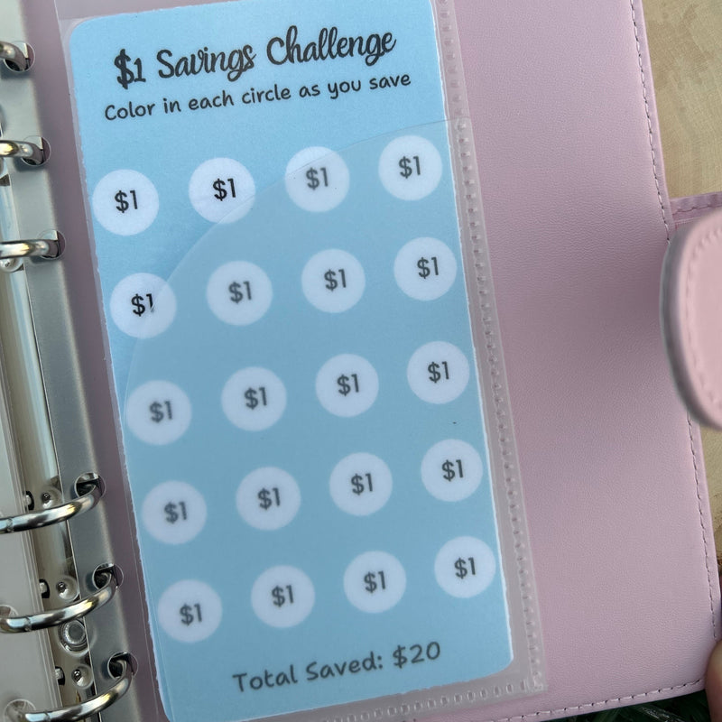 Pink savings challenge tracker with a card inside
