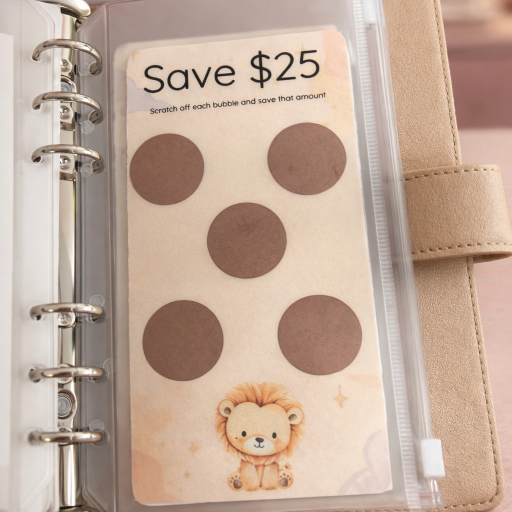 Planner with a savings tracker labeled 'Save $25' featuring lion illustrations.