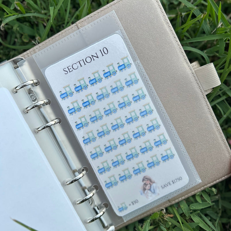 Notebook with a section label on grass