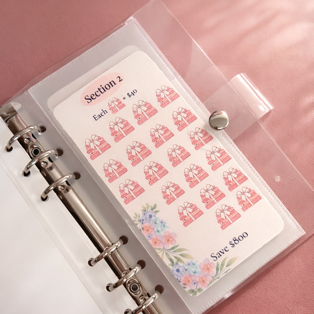 Sticker album with red and white stickers on a pink background