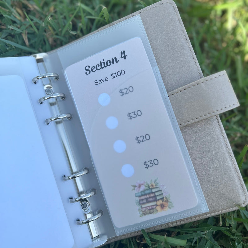 Planner with money tracker on grass
