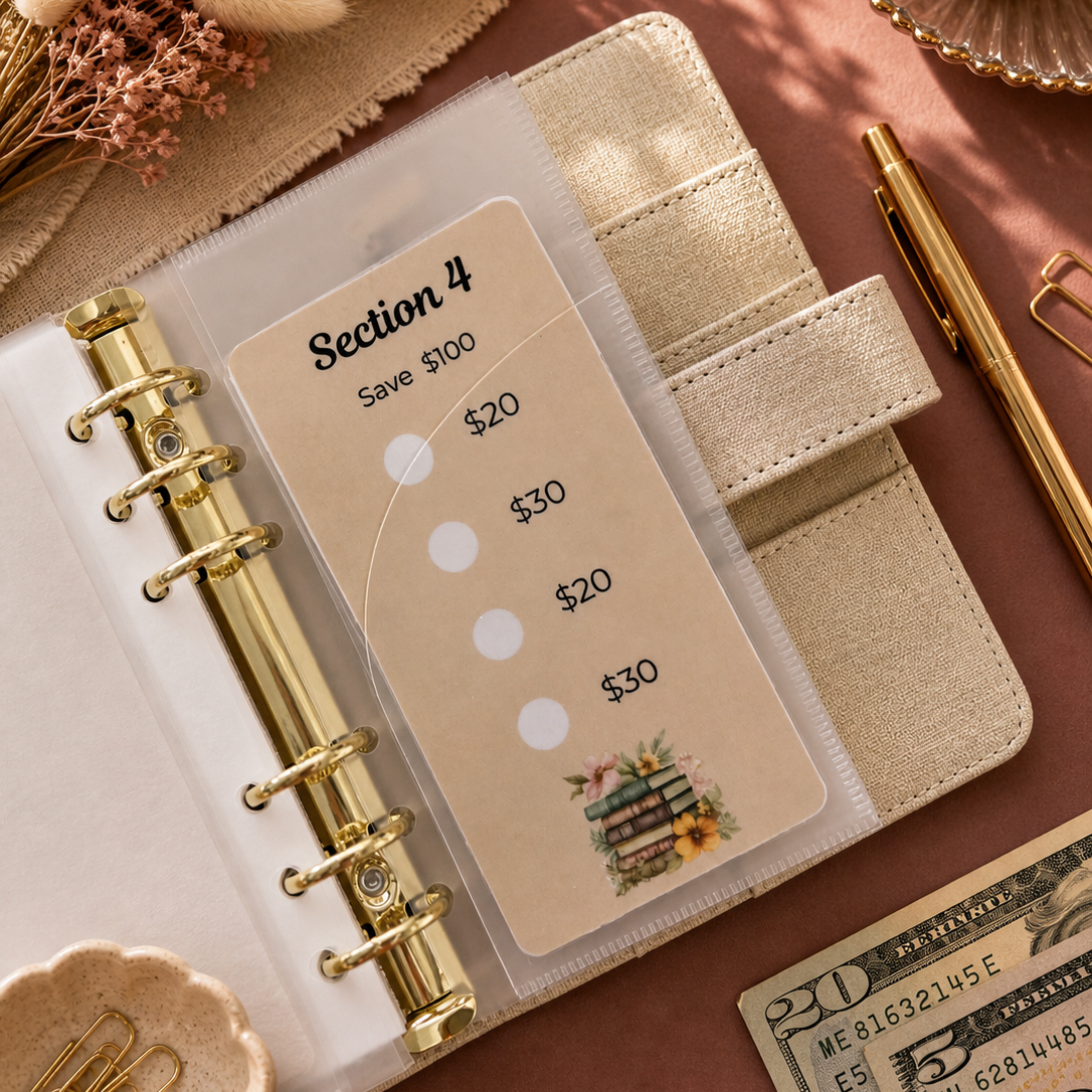 Beige planner with money tracking card on a brown surface with decorative elements