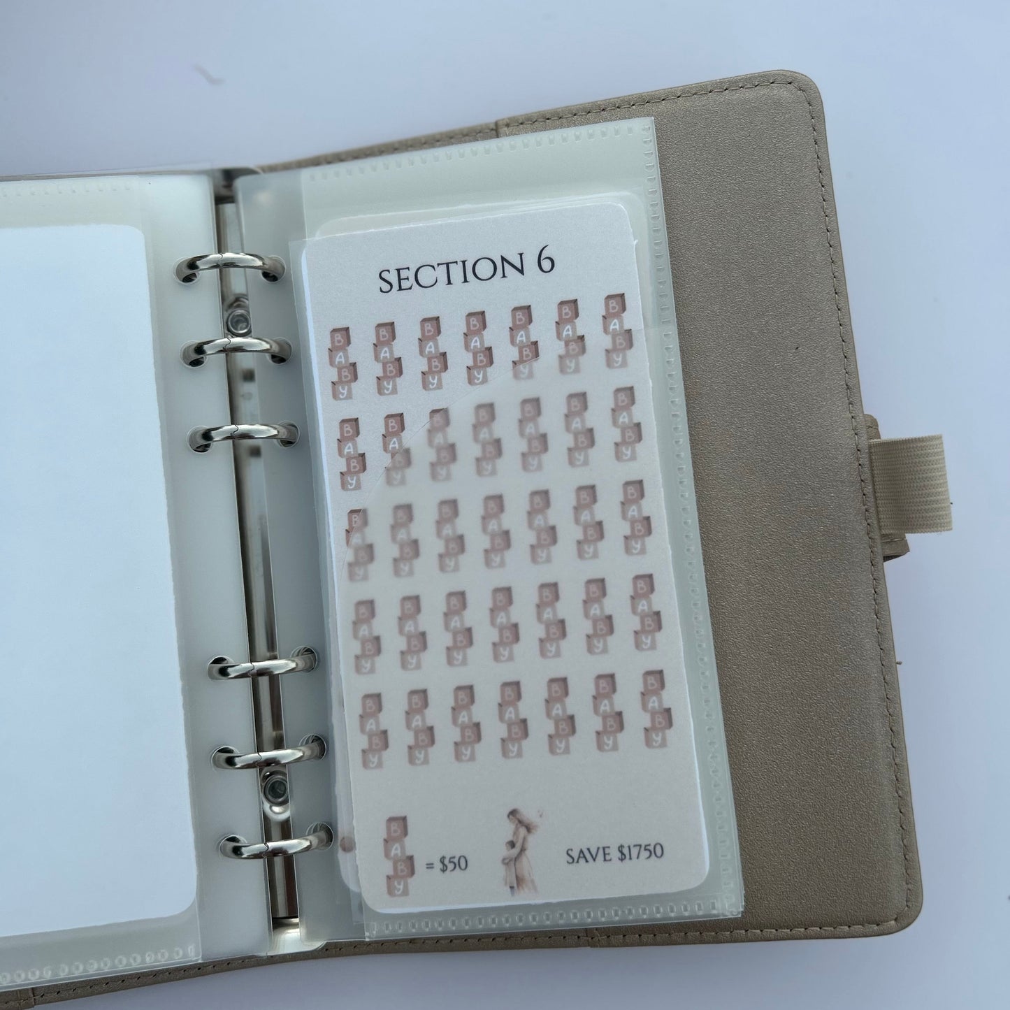 Open notebook with a section 6 page inside on a white background