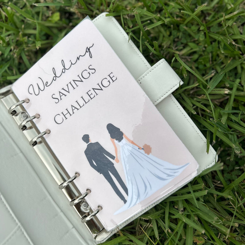 wedding savings challenge sitting on grass