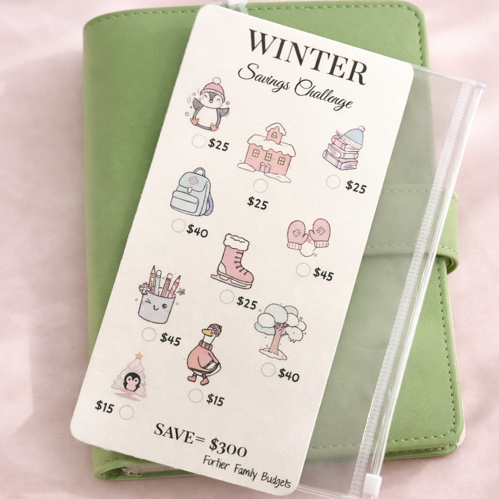 Green planner with a 'Winter Savings Challenge' sheet on a pink background